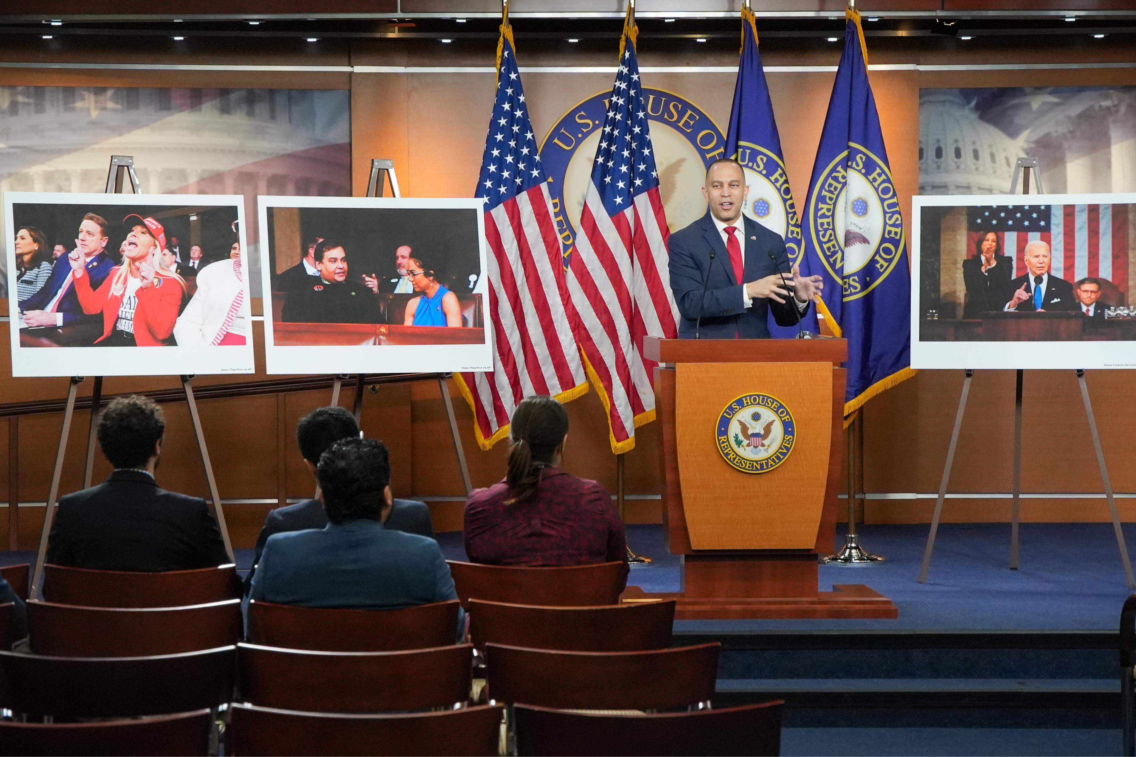 Leader Jeffries Speaks at a Press Conference with photos of the state of the union address