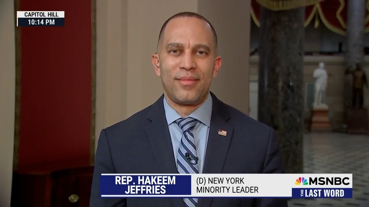 Leader Jeffries stands on Capitol Hill looking into the camera.